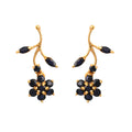 Gold branch earrings with blue gemstones, elegant floral design