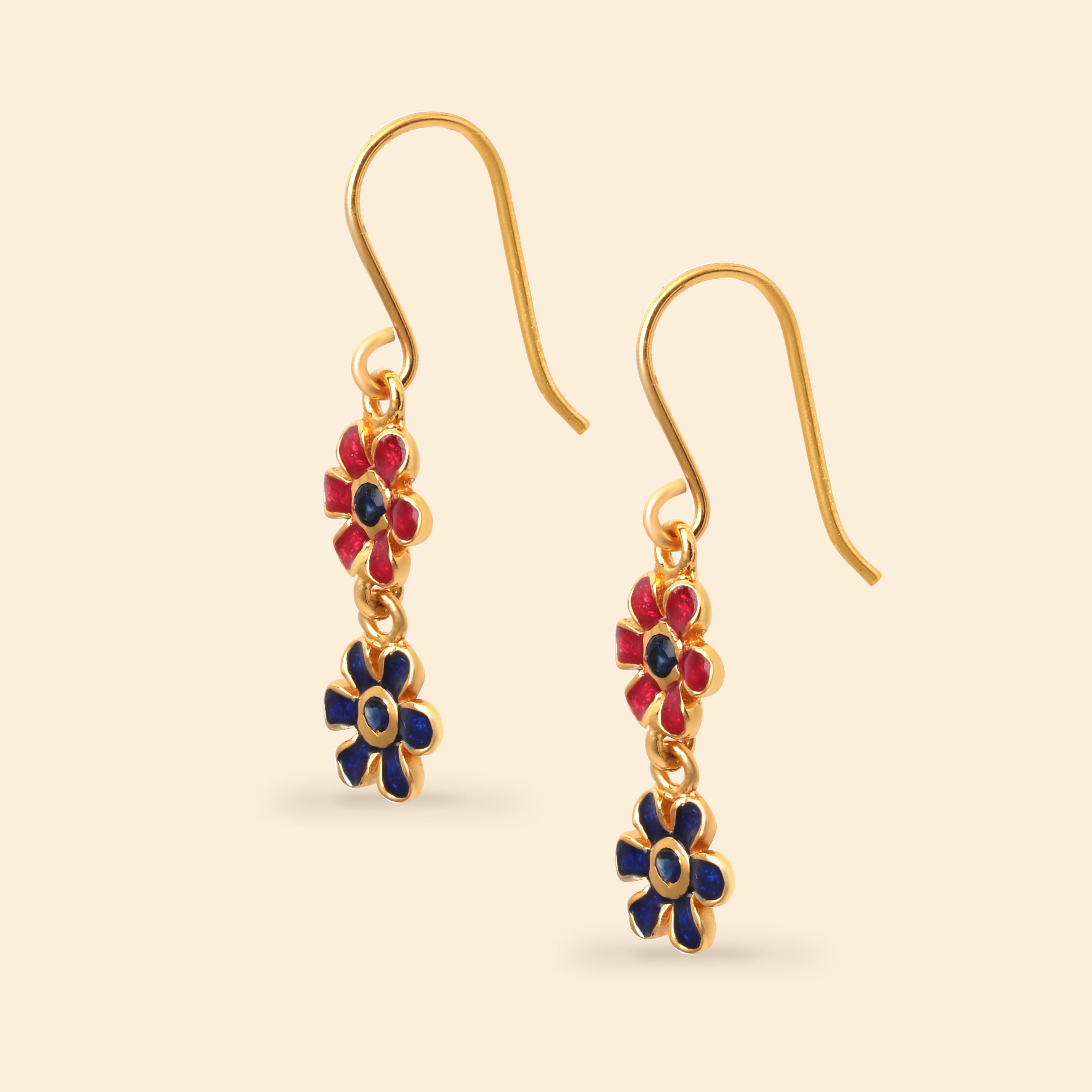 Delicate sapphire gemstone earrings with floral design