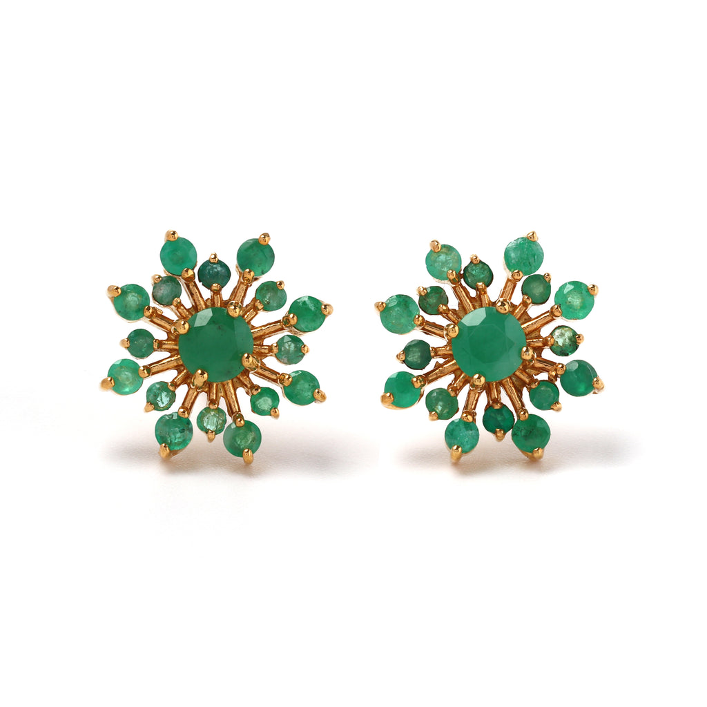 Close-up of emerald stud earrings in 925 sterling silver with gold finish, floral cluster design by Jewelry by Crimson