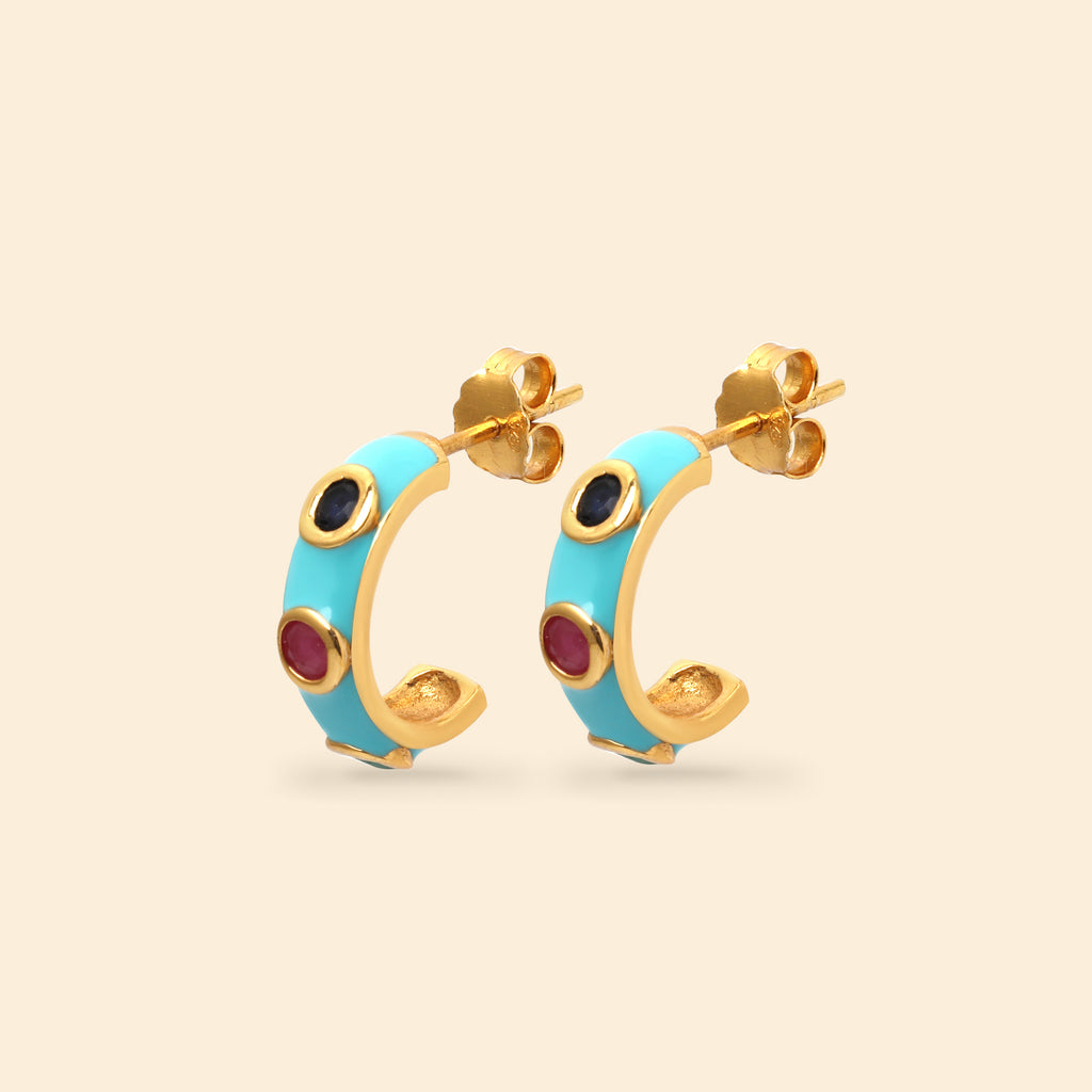 Gold plated sterling silver earrings featuring ruby emerald and sapphire