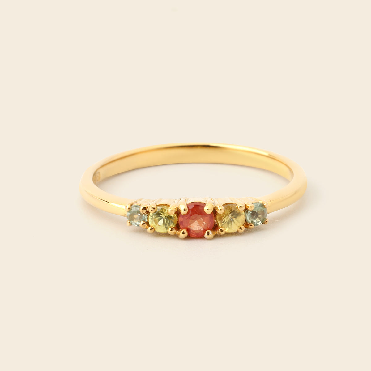 Round multicolor sapphire band ring in gold — detail view
