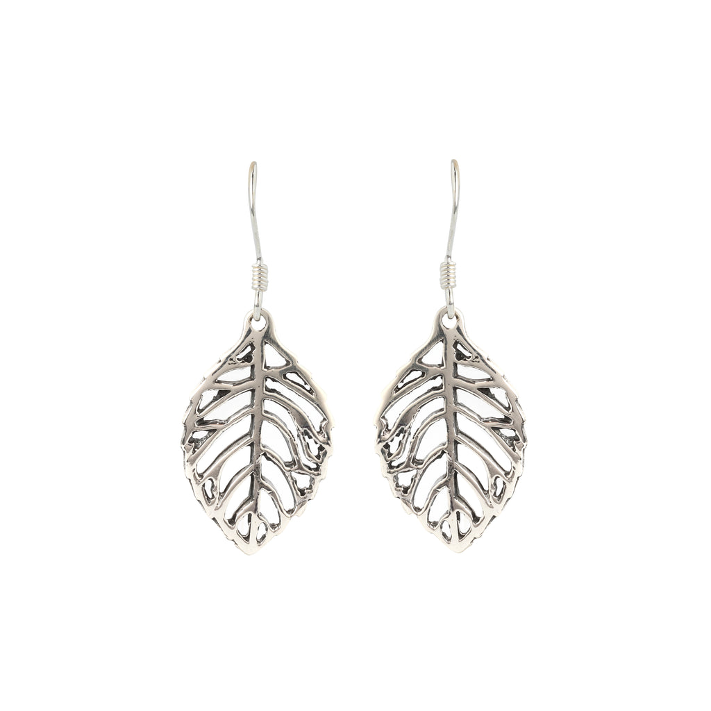 Close-up of leaf-shaped 925 sterling silver drop earrings with openwork veins by Jewelry by Crimson