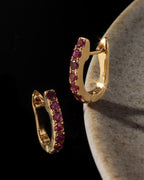 Gold huggie earrings with natural pink tourmaline — pair view