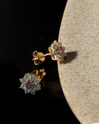 Petite amethyst blue topaz gemstone studs in gold — pair view