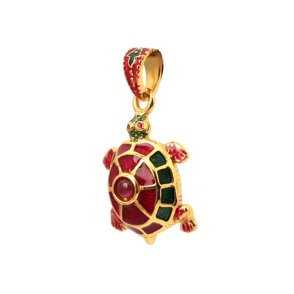 Handcrafted turtle pendant with ruby gemstone and enamel details
