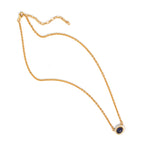 Gold chain necklace with blue gemstone pendant, elegant minimalist design for everyday wear
