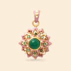 Floral pendant with green gemstone, pink enamel, and gold-tone setting, handcrafted jewelry