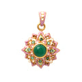 Floral pendant with green gemstone, pink enamel, and gold-tone details, handcrafted jewelry
