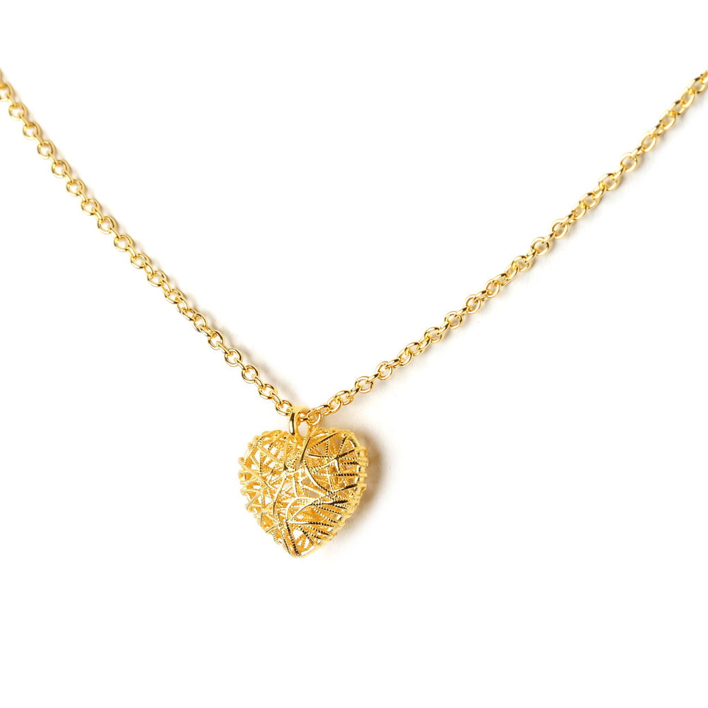Detailed filigree heart pendant crafted in 925 sterling silver with gold finish