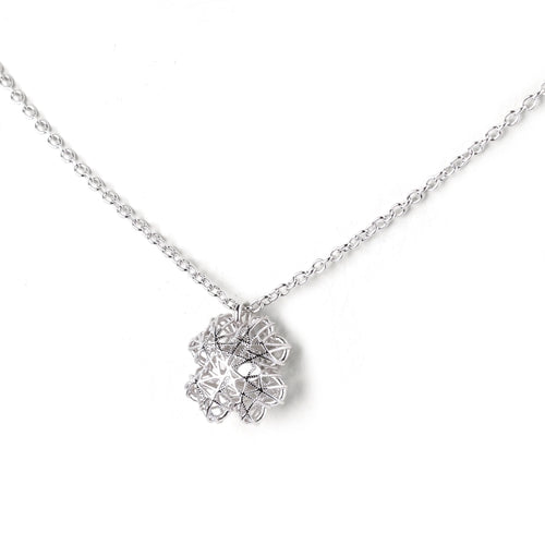 Sterling silver necklace with intricate filigree pendant, elegant design for everyday wear
