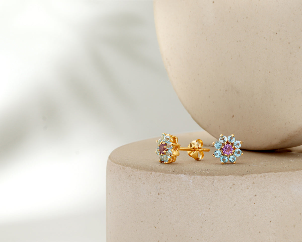 Amethyst and blue topaz flower stud earrings — display view