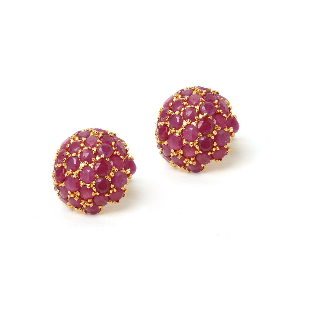 Gold plated sterling silver earrings featuring natural rubies