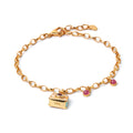 Gold plated ruby charm bracelet in 925 sterling silver with delicate chain design
