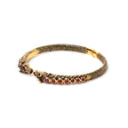 Luxury ruby cuff bracelet with horse motif design
