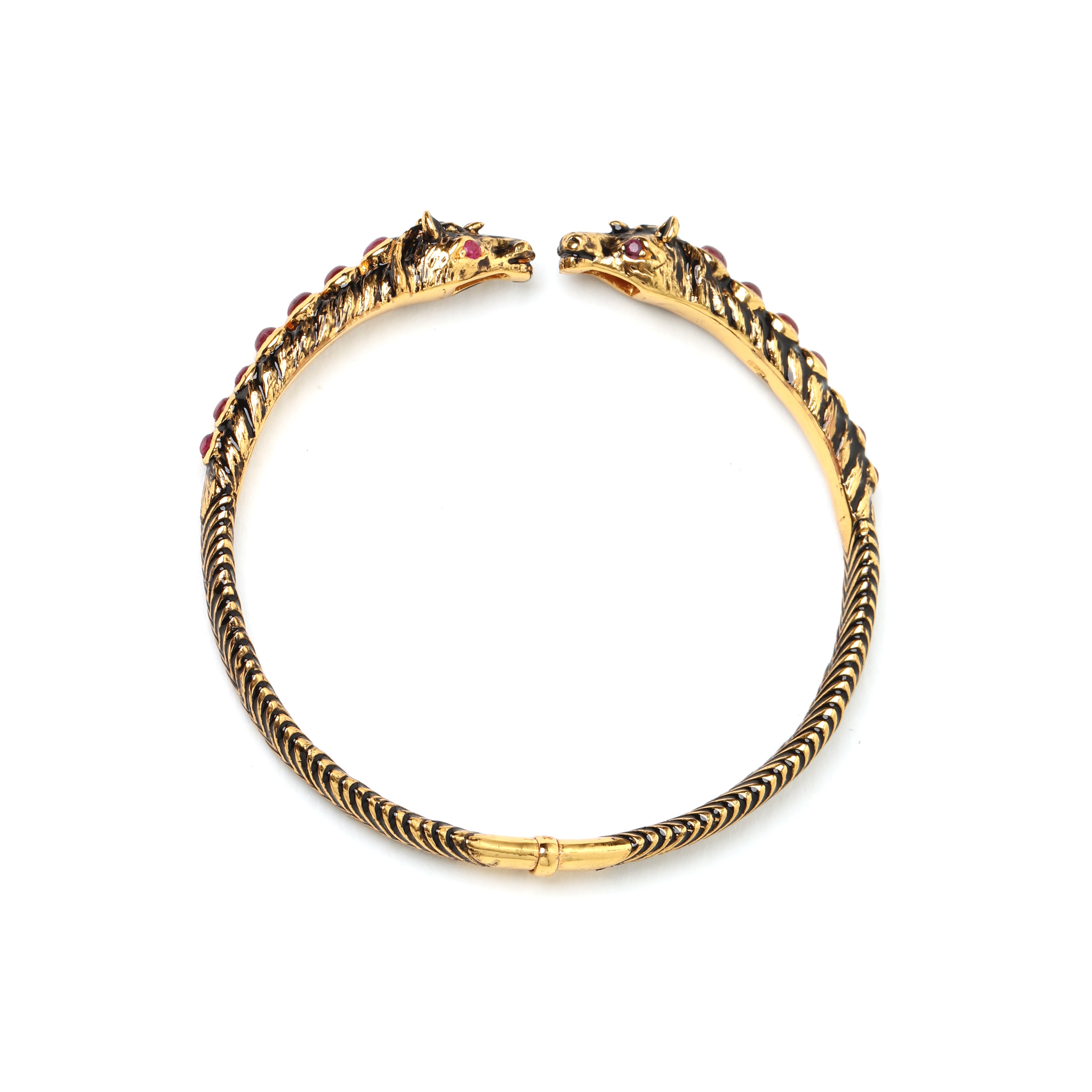 Handcrafted horse bracelet featuring natural ruby gemstones
