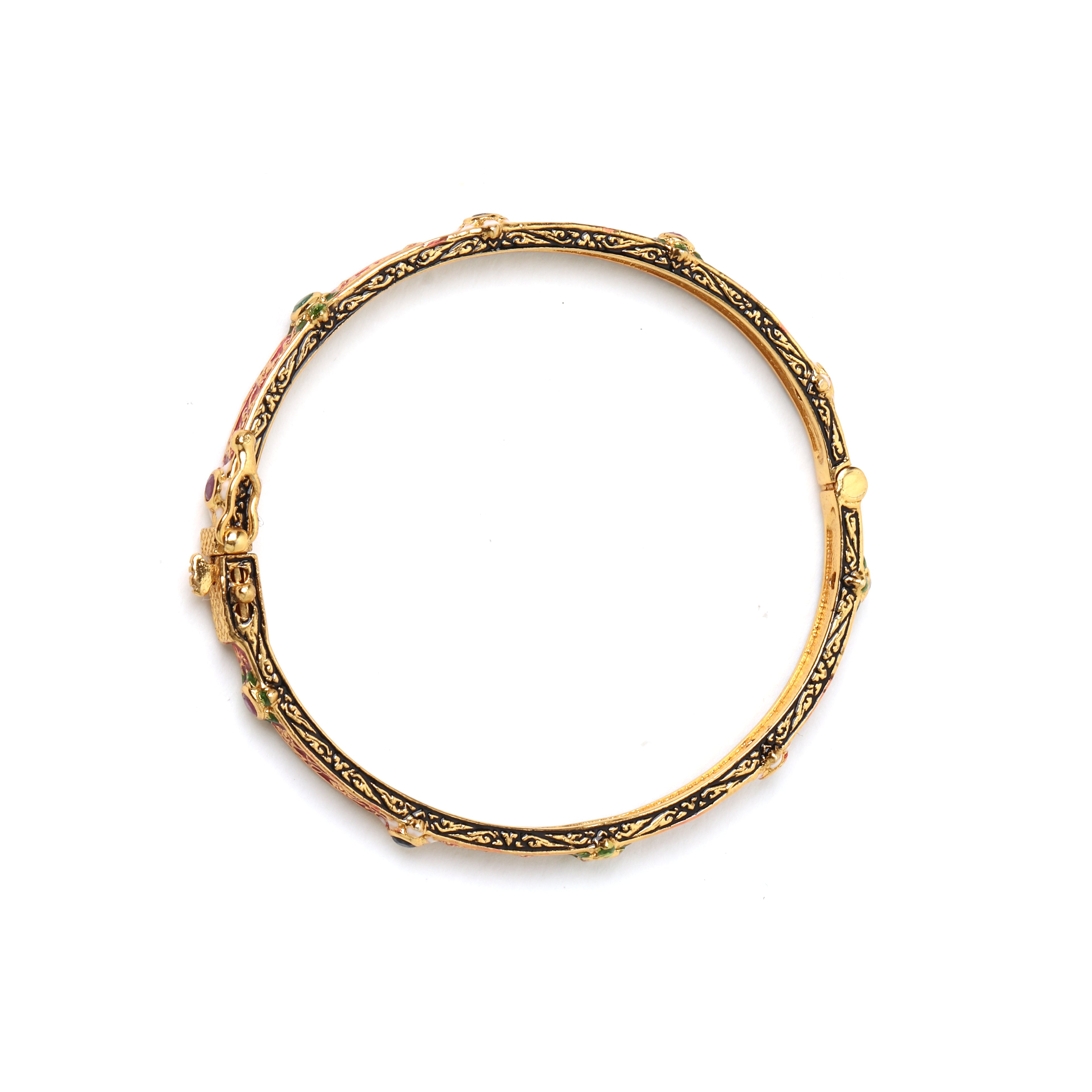 Luxury gemstone bangle featuring emerald ruby and sapphire accents
