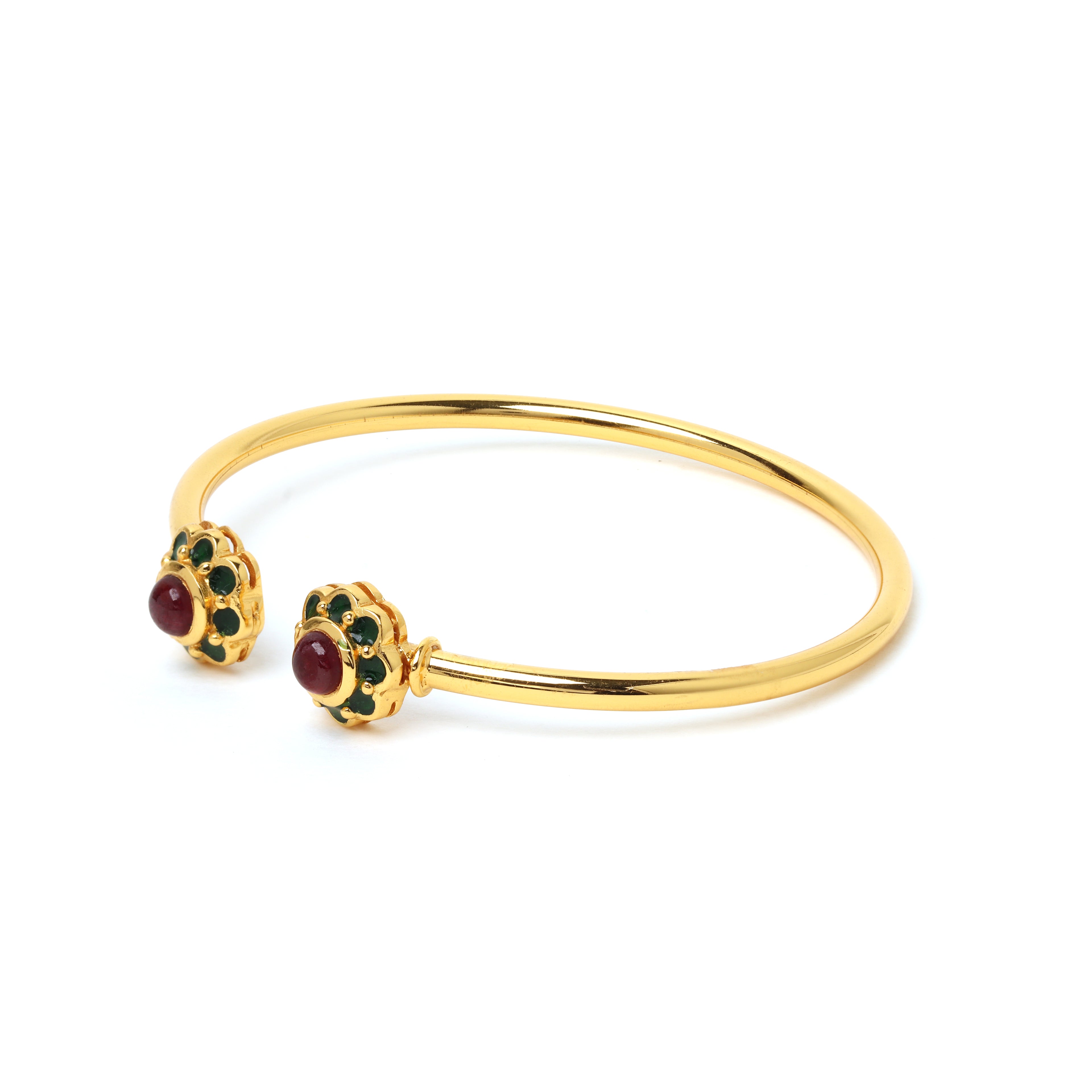 Gold plated ruby bracelet with green enamel flower accents