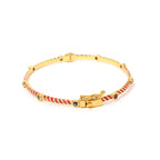 Emerald ruby sapphire bracelet with red enamel detailing