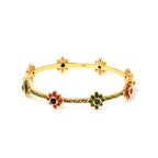 Ruby and sapphire floral bracelet in gold plated sterling silver