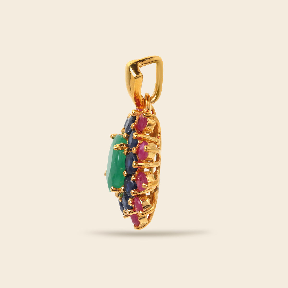 Emerald flower cluster pendant with sapphire and ruby in gold — side view
