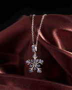 Blue sapphire snowflake pendant in sterling silver — packaging view