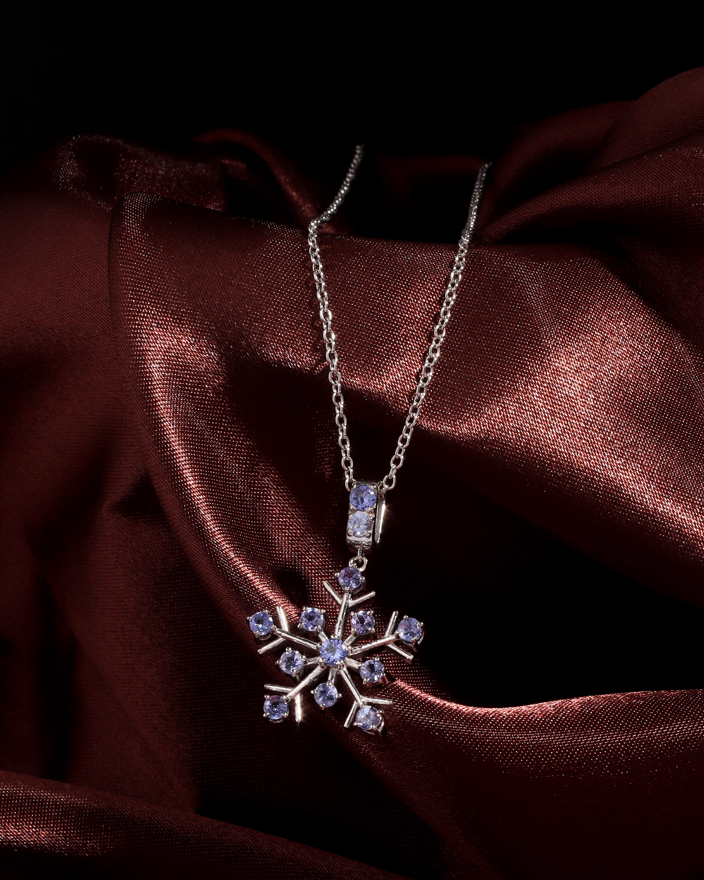 Tanzanite snowflake pendant in sterling silver — packaging view