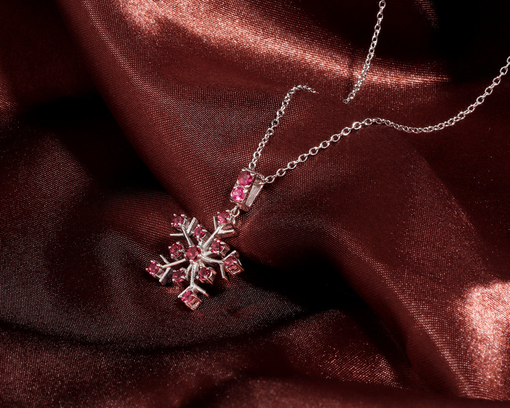 Pink tourmaline snowflake pendant in 925 silver — display view