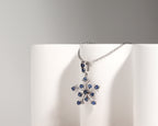 Natural blue sapphire snowflake necklace charm handcrafted in Bangkok