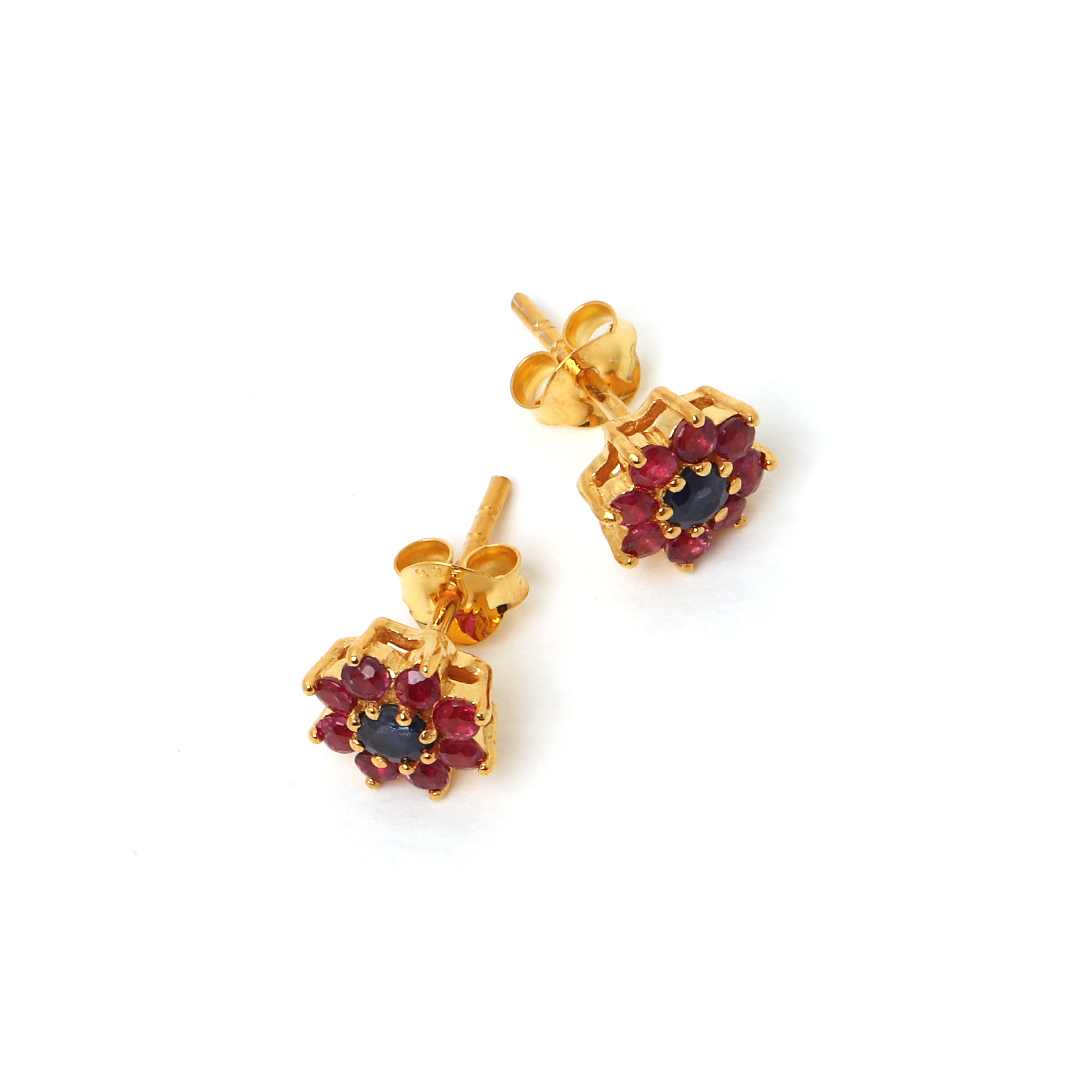 Ruby flower earrings with blue sapphire center gemstone
