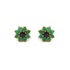 Flower-shaped stud earrings with emerald and sapphire gemstones in gold setting