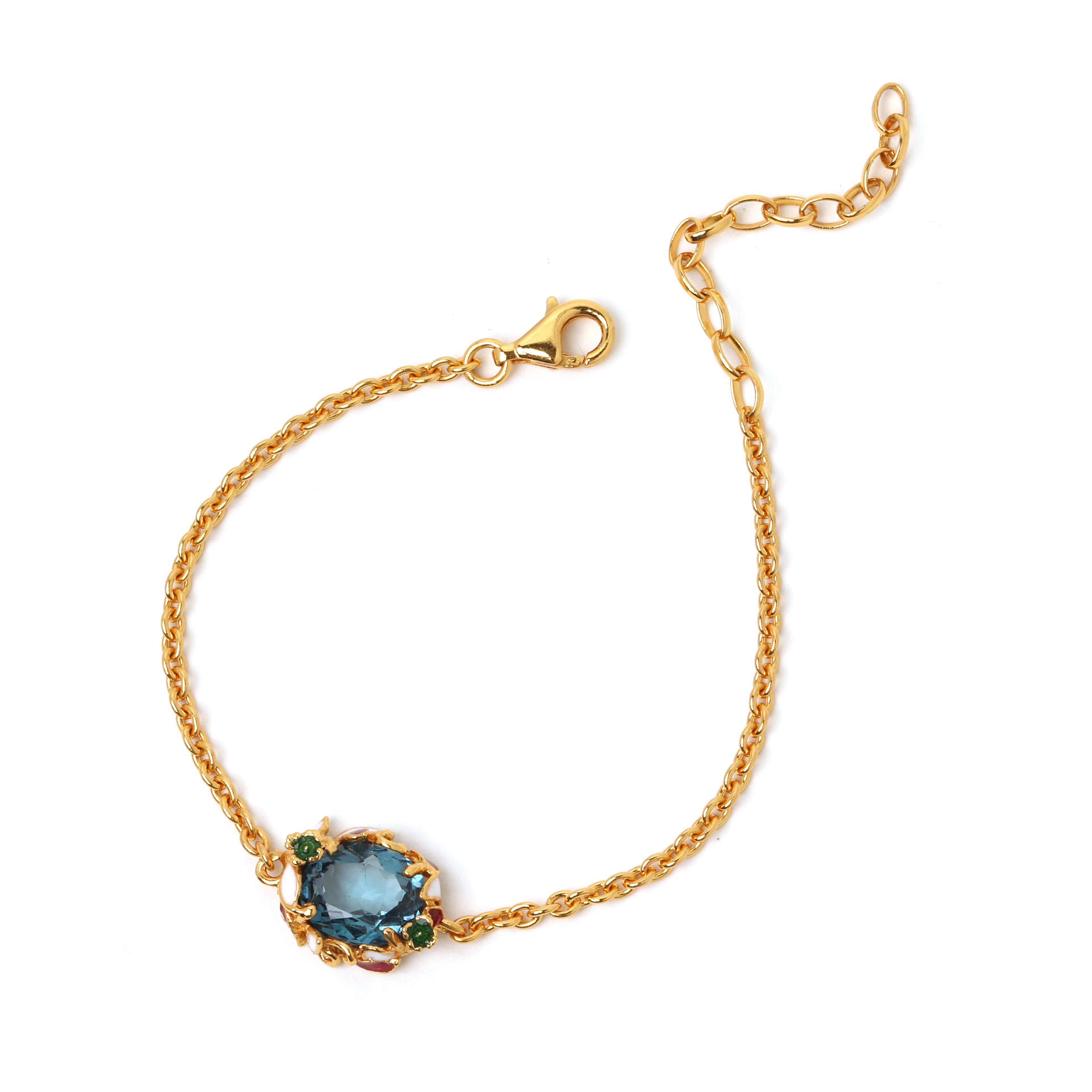 Natural blue topaz bracelet in gold plated sterling silver