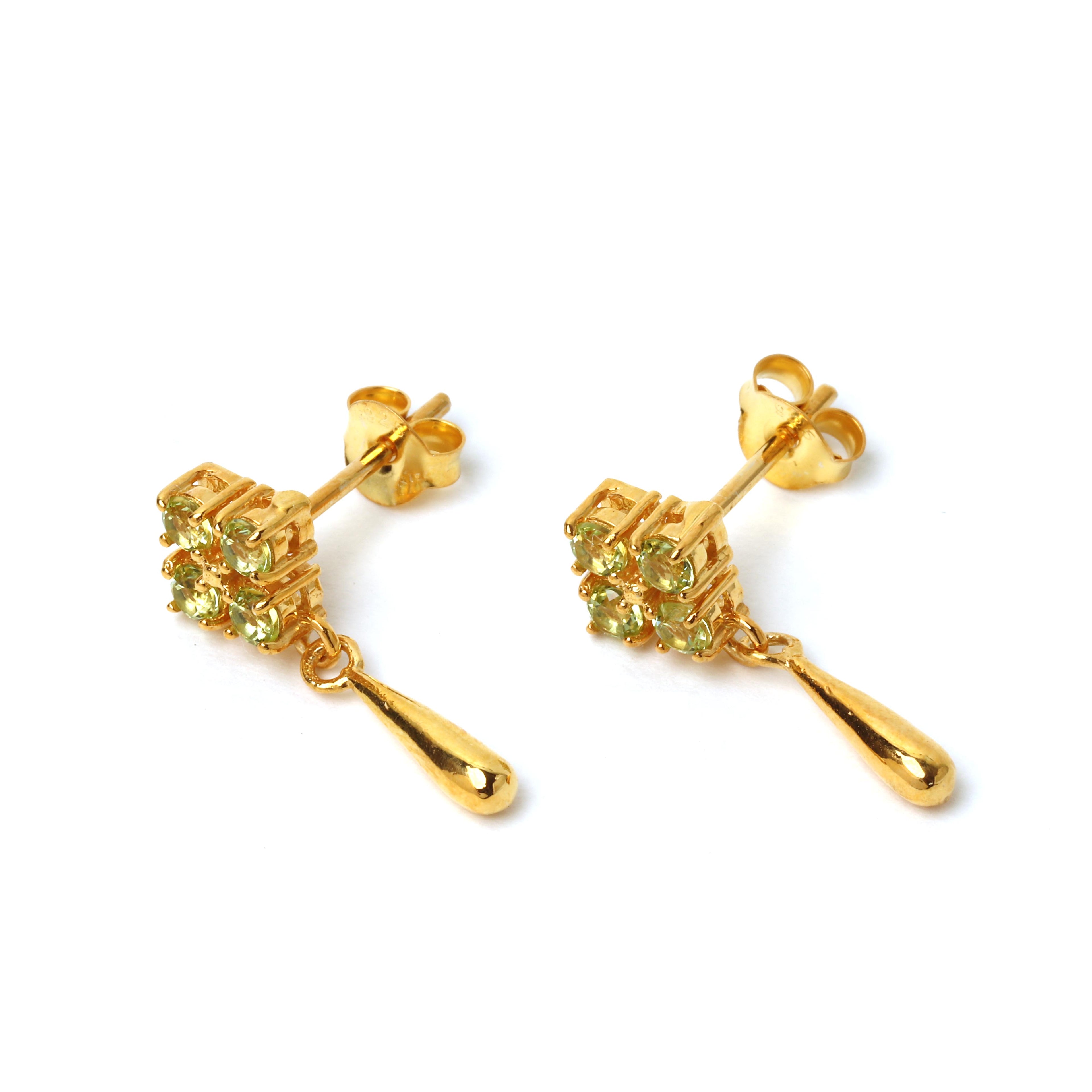 Gold plated peridot earrings with sunburst inspired design
