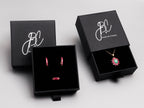 Ruby Huggie Hoop Earrings in 18K Gold