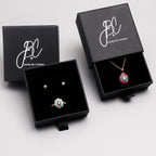 Emerald ruby and sapphire flower pendant in 18K gold — display view