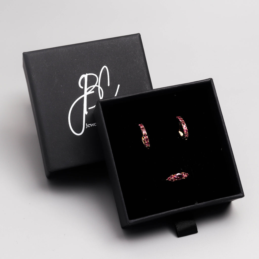 Pink tourmaline huggie hoop earrings in 18K gold — display view