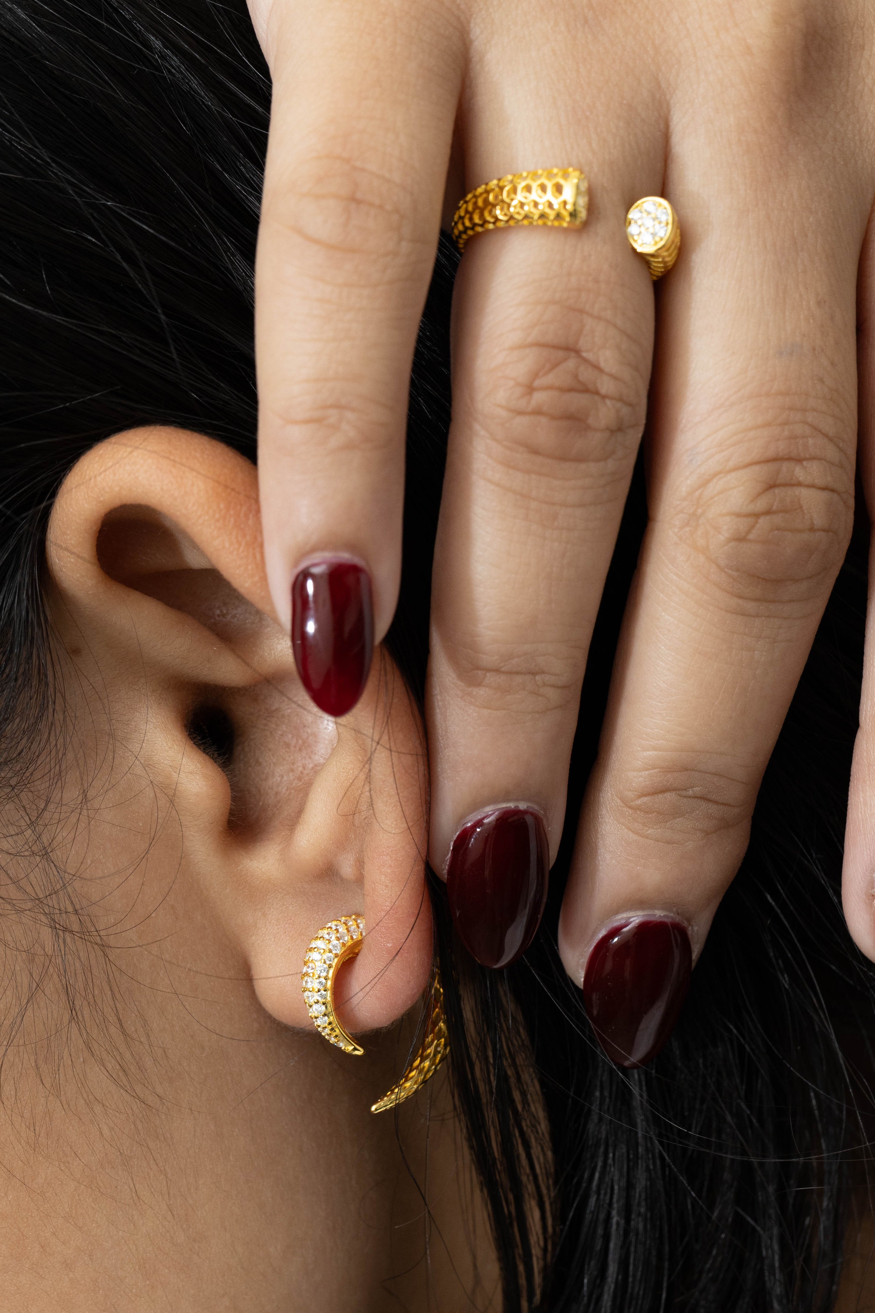 Modern tusk drop earrings with polished gold finish