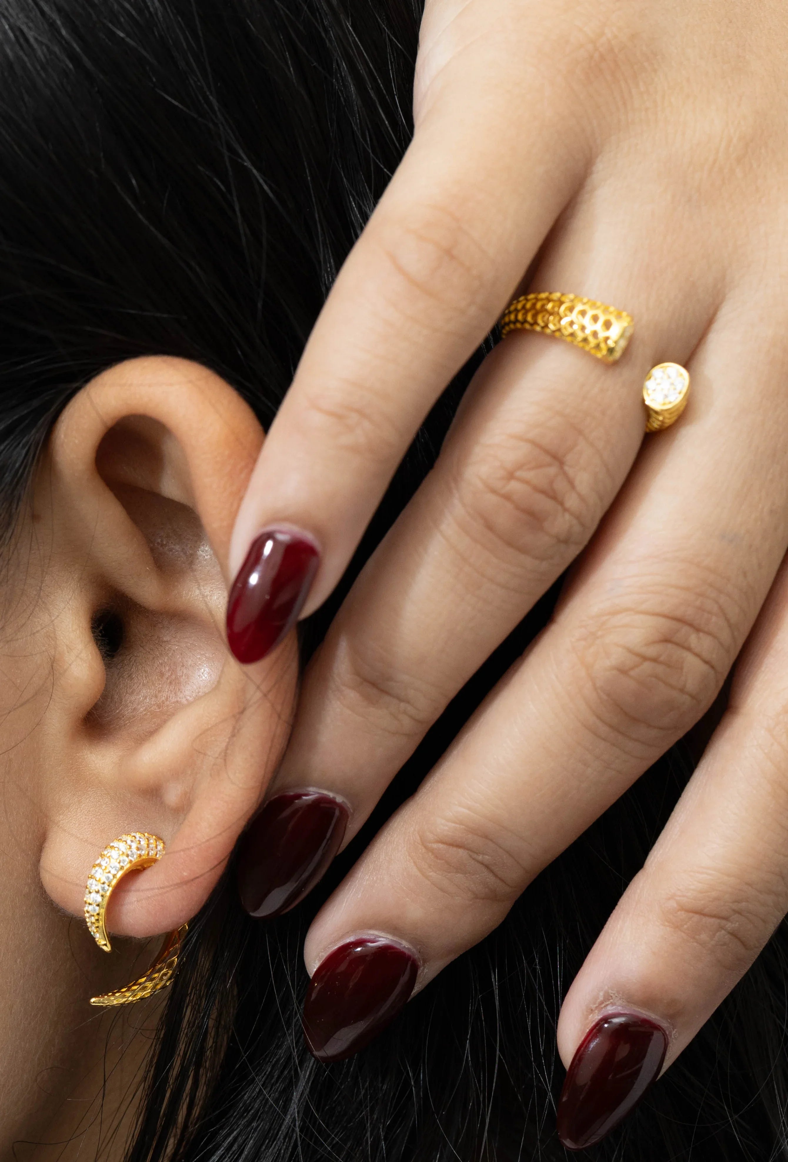 Elegant gold open ring with cubic zircon accents