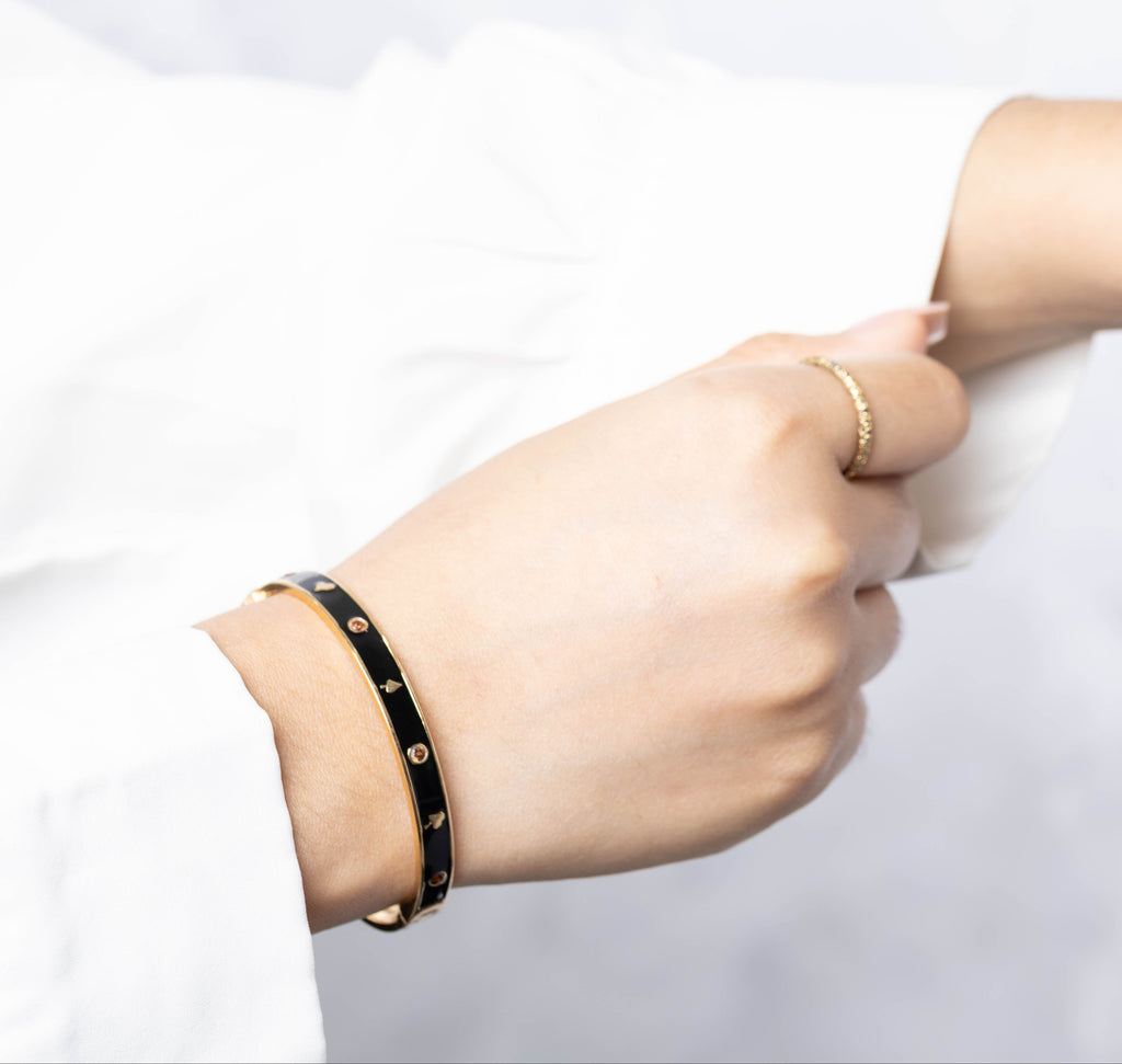 Refined black and gold bangle bracelet for everyday wear