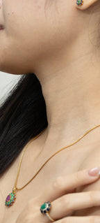 Gold necklace with emerald, ruby, sapphire pendant, matching ring and stud earrings, elegant gemstone jewelry