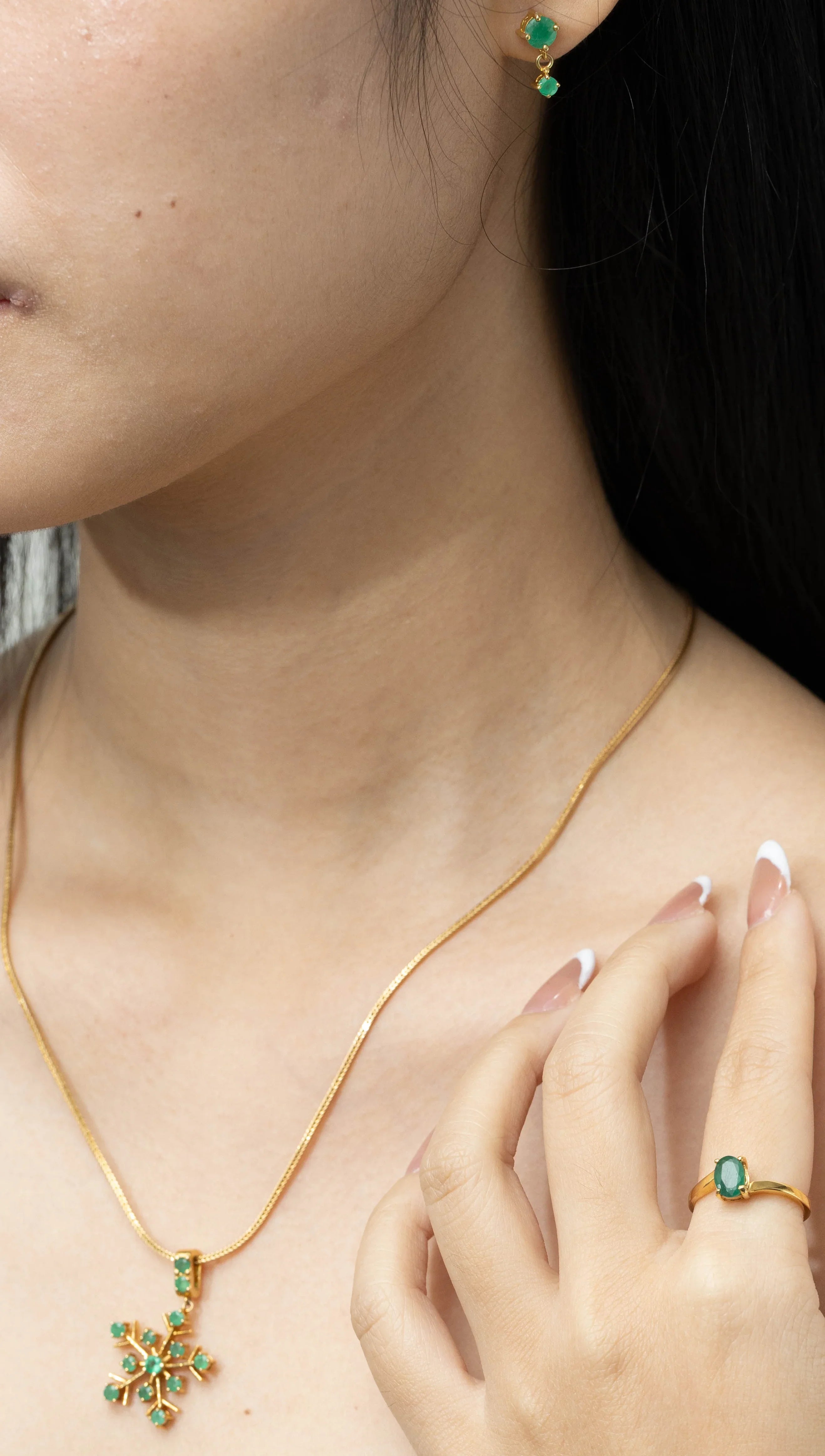 Modern emerald earrings designed for elegant wear