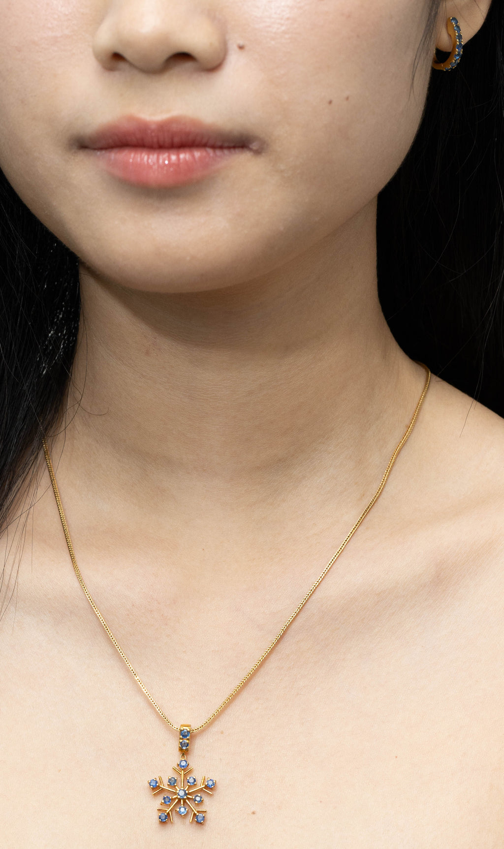 Sapphire huggie hoop earrings in gold plated silver