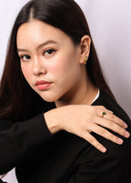 Unique ring with emerald gemstone and refined sterling silver ring finish