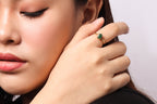 Luxury ring with green gemstone ring style and gold plated detail