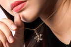 Handmade necklace with sapphire gemstone pendant and polished gold finish