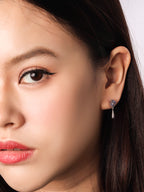 Blue-violet tanzanite silver dangle earrings — side view