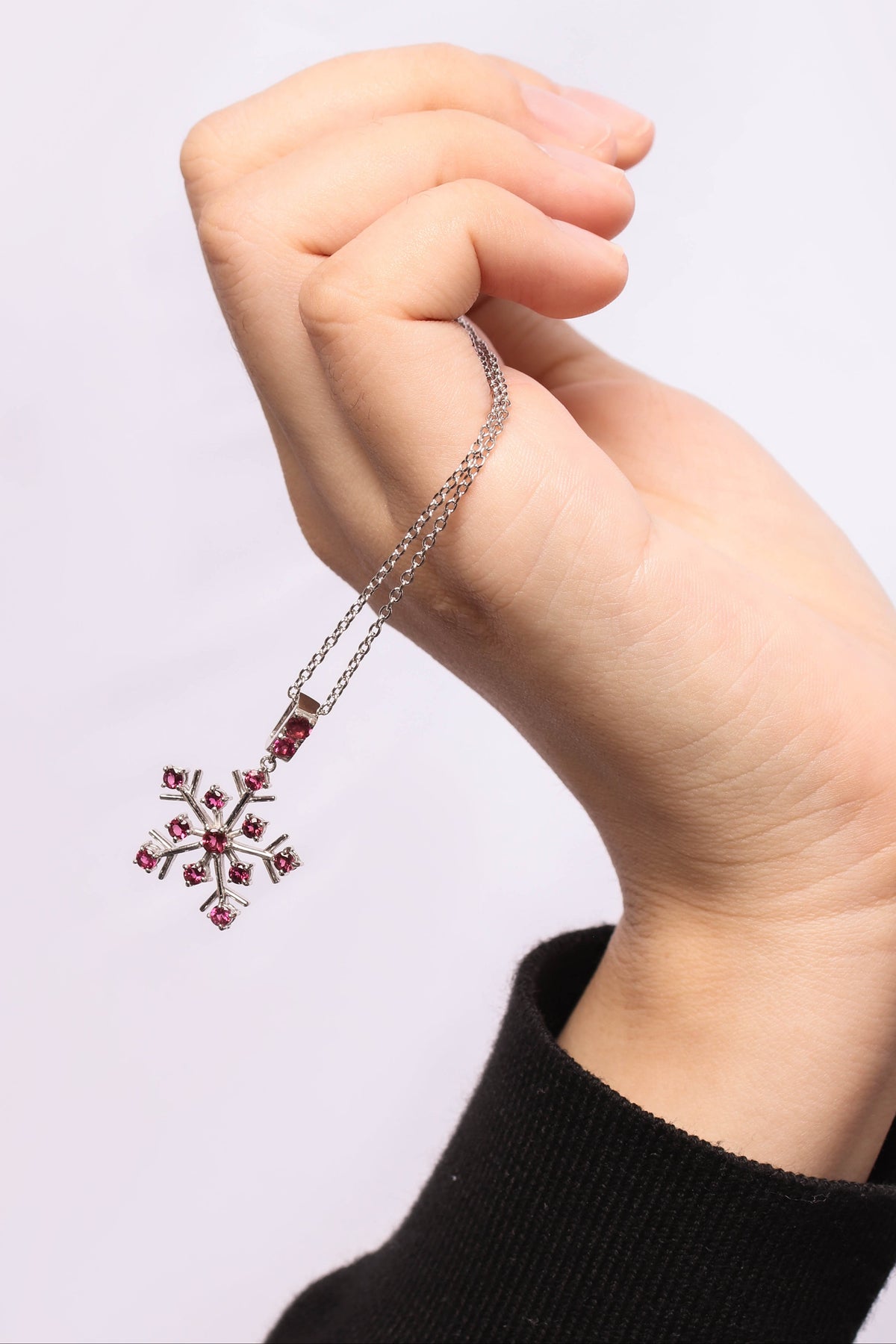 Natural pink tourmaline snowflake necklace charm handcrafted in Bangkok