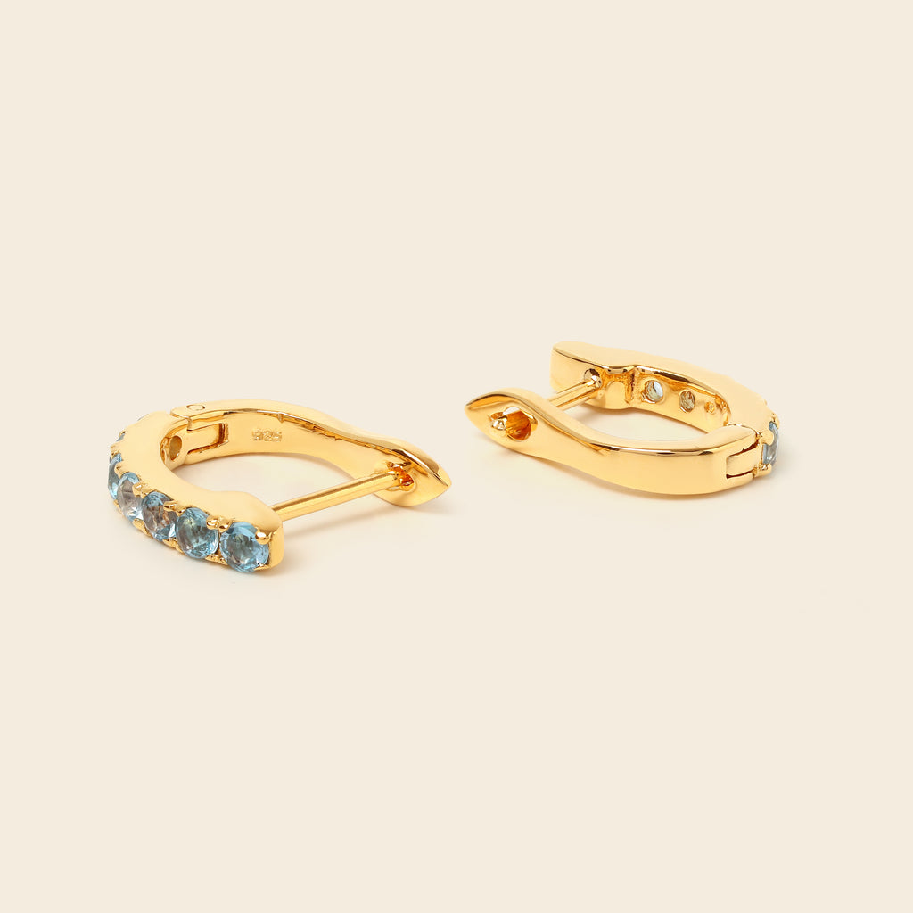 Natural blue topaz gold hoops handcrafted in Bangkok