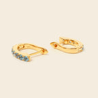 Natural blue topaz gold hoops handcrafted in Bangkok