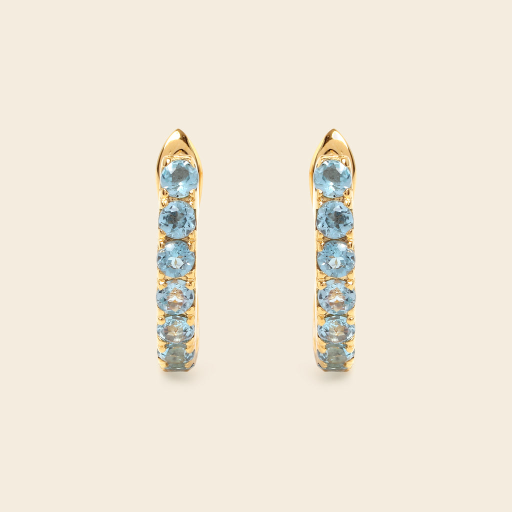 Blue topaz hoop earrings with latch back closure