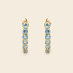 Blue topaz hoop earrings with latch back closure